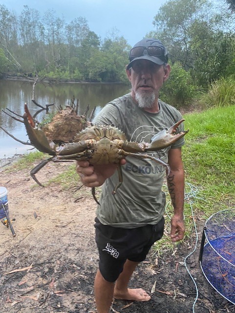 A Nurture & Bloom participant on a crabbing adventure